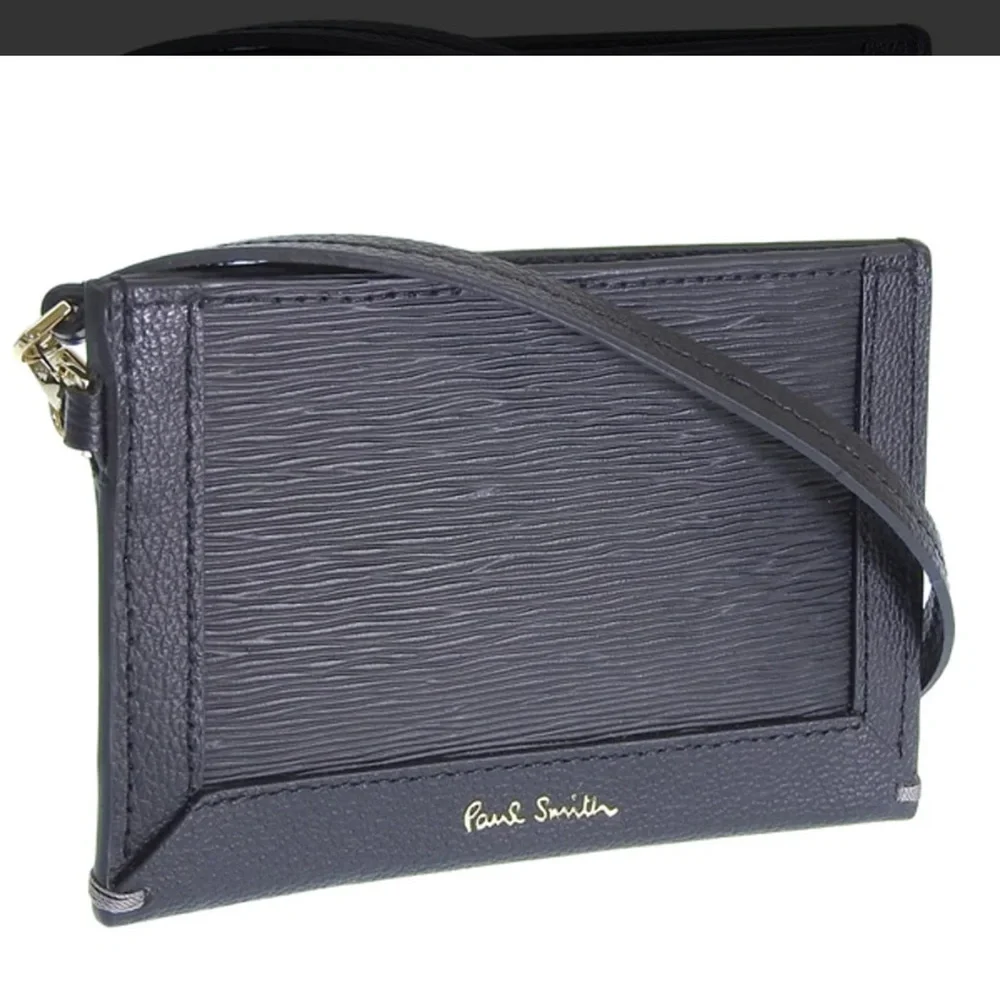 Check out Paul Smith!!Black Textured Leather card holder. NWOT.  Men or women’s